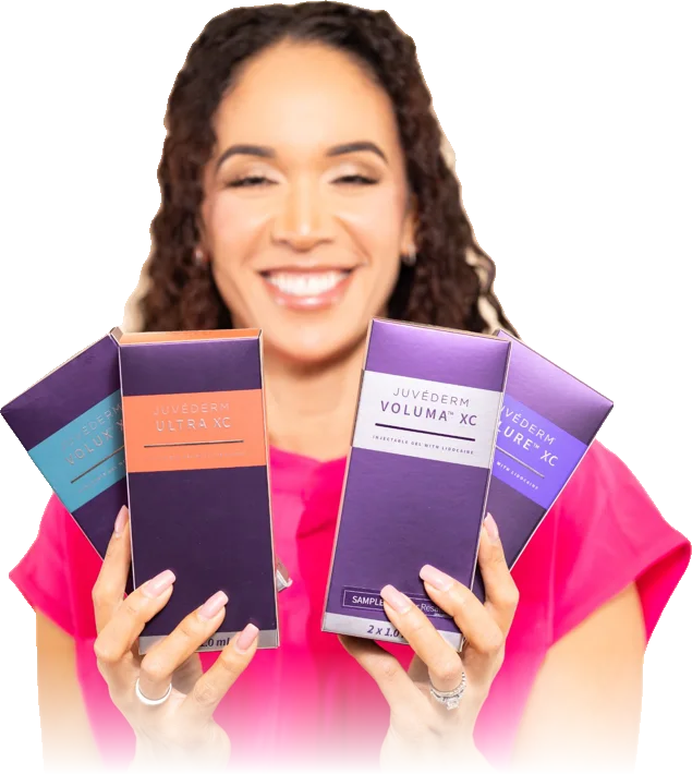 Cassie holding boxes of Juvederm filler